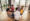 Diverse group of people sitting in circle in group therapy session.