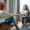 Pleasant psychologist shaking hand of her stressed client