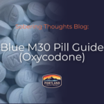 M30 Pill blue round oxycodone 30 mg with image of bottle of m30 oxycodone on the left side of image zoomed in